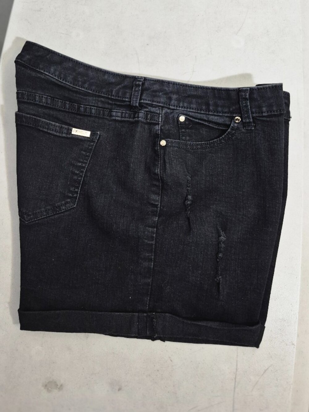 Jennifer Lopez ladies' black distressed stretch shorts, in size 12